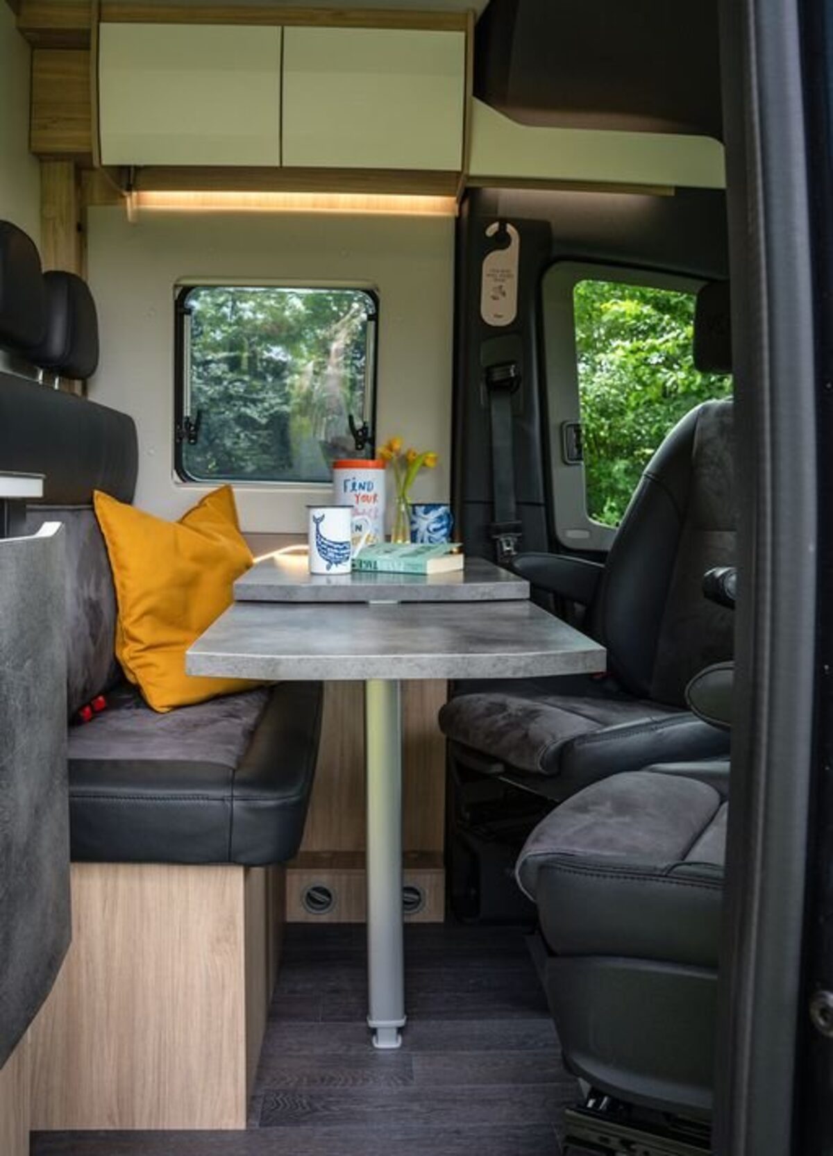 Frankia Yukon 4x4 rear bed with lake view through open doors